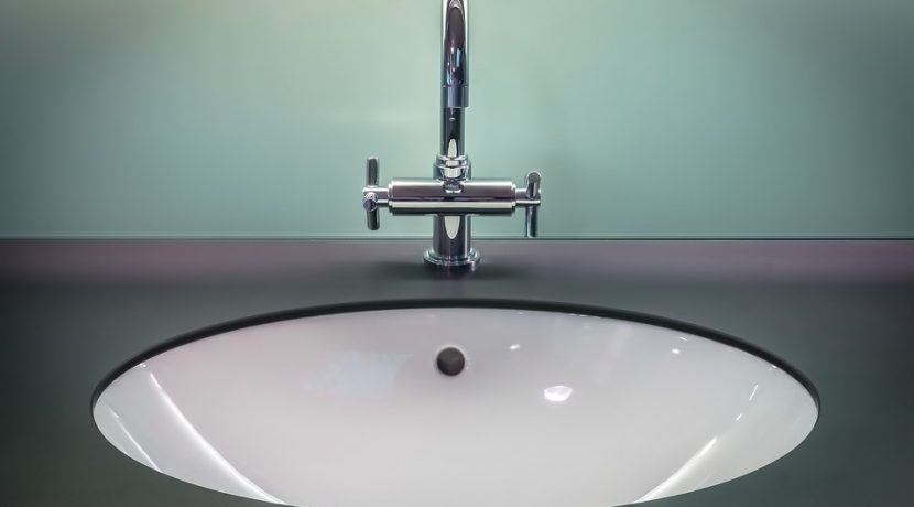 Can you use steel wool to remove stains from a fiberglass sink?