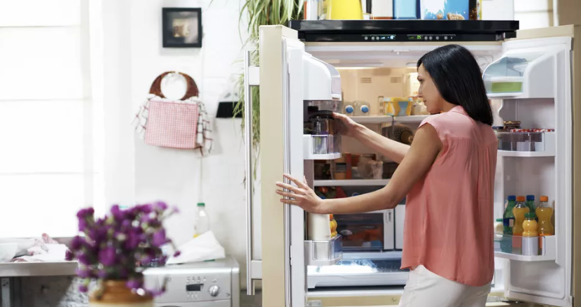 A Women Opening Refrigerator